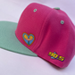 SnapBack Arnold corazón